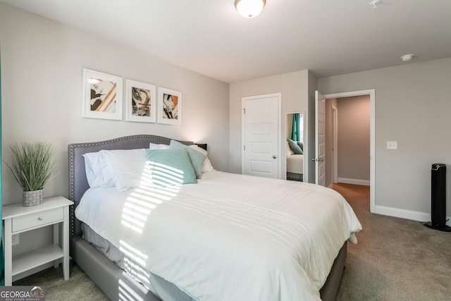 bedroom featuring carpet