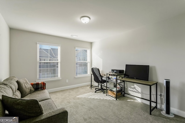 office space featuring light colored carpet