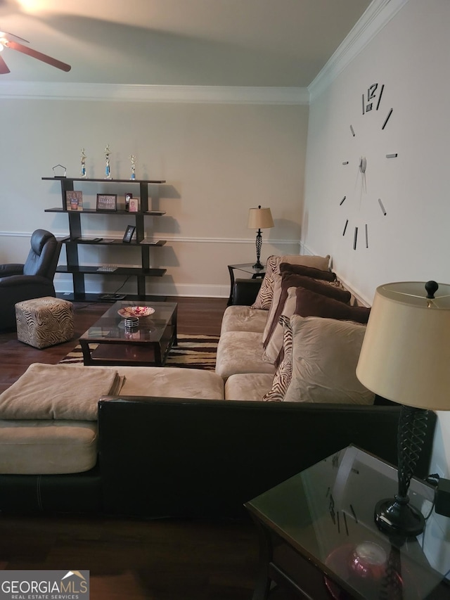 living room featuring crown molding, ceiling fan, and wood-type flooring