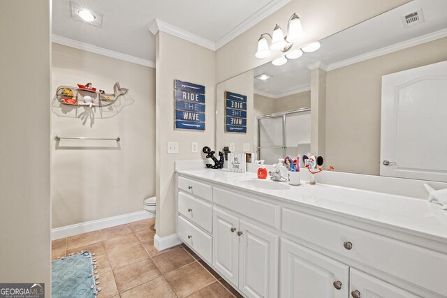 bathroom with walk in shower, tile patterned floors, toilet, ornamental molding, and vanity