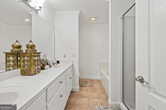 full bathroom featuring tile patterned flooring, crown molding, vanity, and toilet