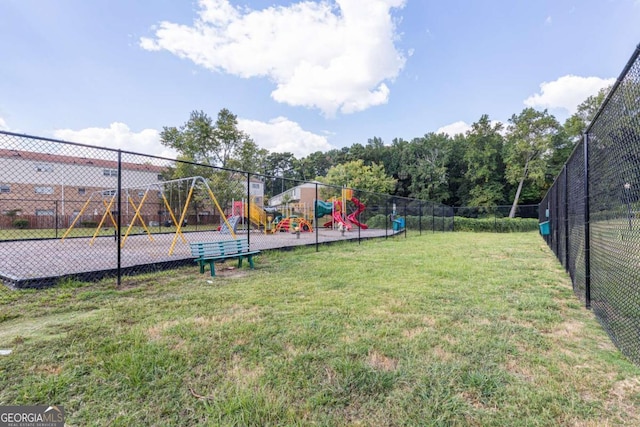 view of play area featuring a lawn