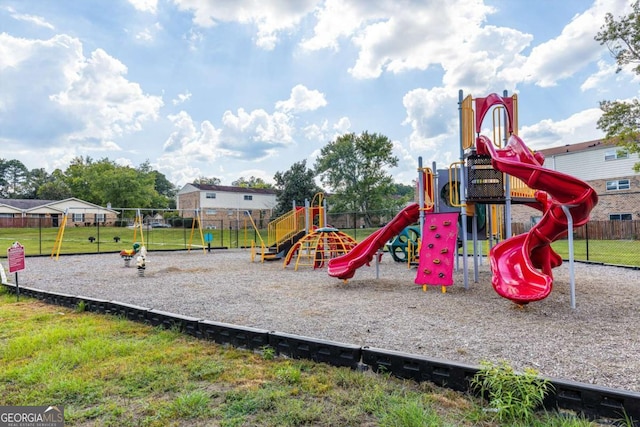 view of playground with a yard