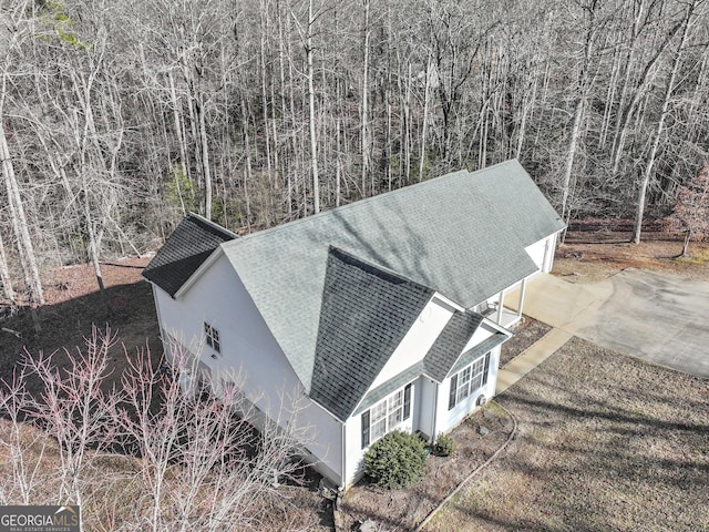 view of property exterior featuring a garage