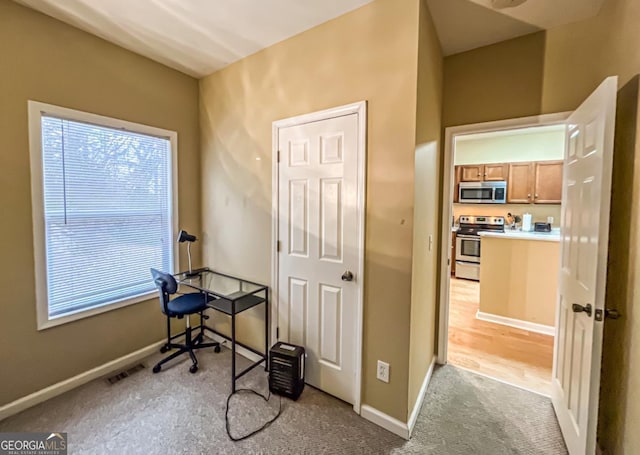 view of carpeted home office