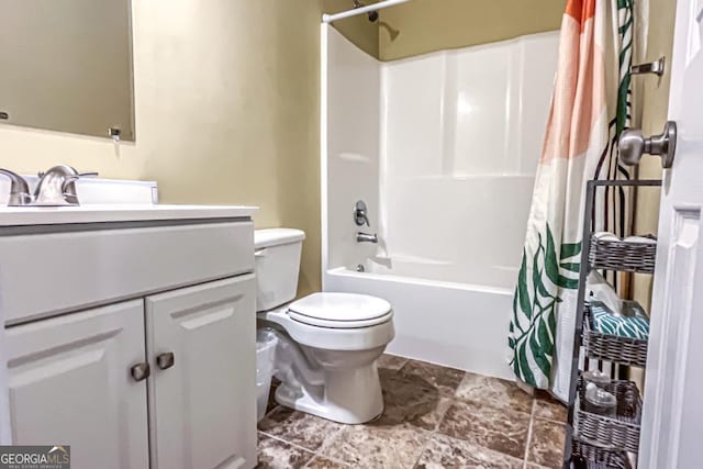 full bathroom with shower / bath combo, vanity, and toilet