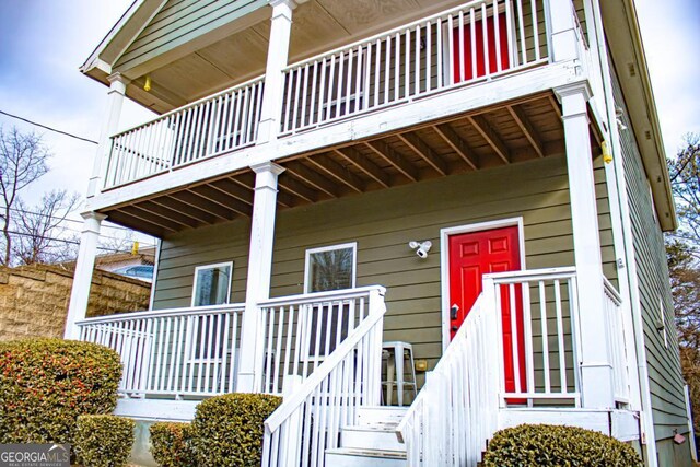 doorway to property with a balcony