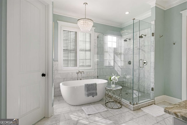 bathroom with crown molding, separate shower and tub, and a notable chandelier