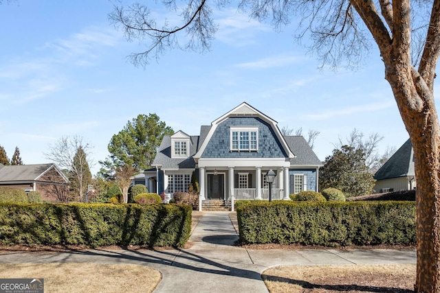 view of front of property featuring covered porch