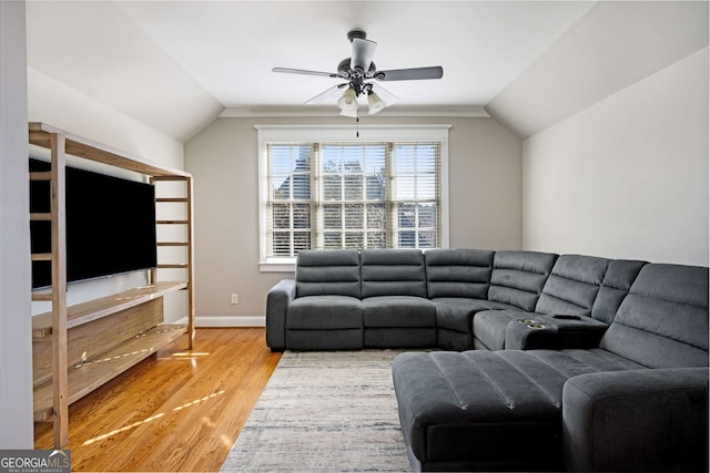 living room with vaulted ceiling, ceiling fan, and hardwood / wood-style floors