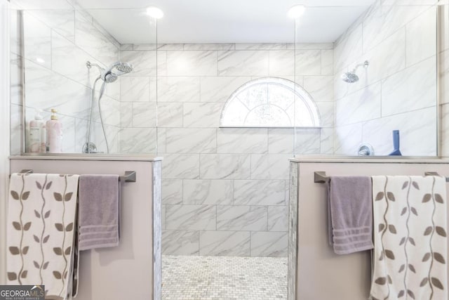 bathroom with tiled shower