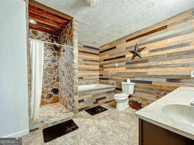 full bathroom featuring vanity, plus walk in shower, toilet, and wood walls