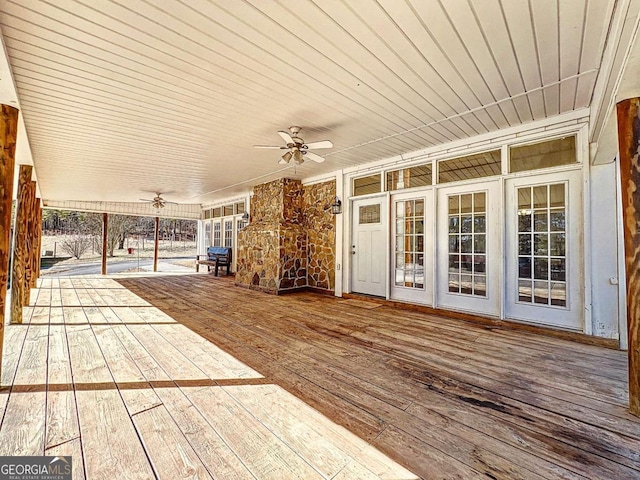 wooden deck with ceiling fan