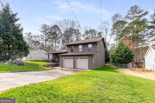 view of front facade featuring a chimney, concrete driveway, fence, a garage, and a front lawn