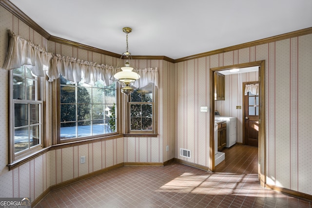 unfurnished dining area with wallpapered walls, baseboards, visible vents, and ornamental molding