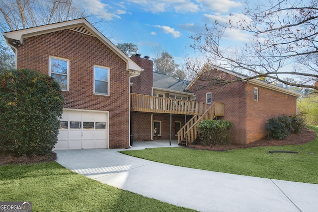 view of front of house with concrete driveway, brick siding, stairway, and a chimney