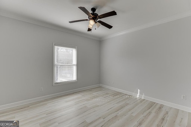 unfurnished room featuring crown molding, ceiling fan, and light wood-type flooring