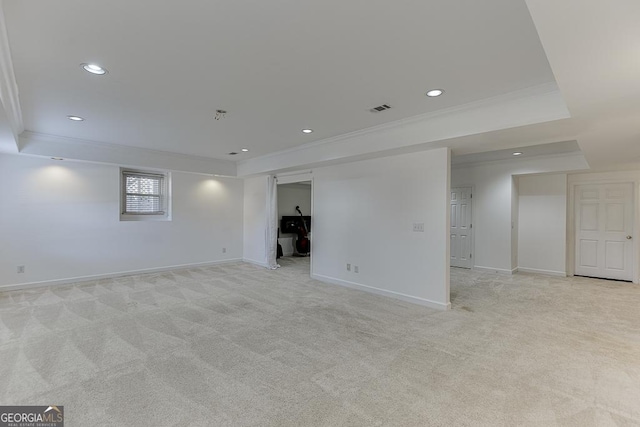 interior space with light colored carpet and ornamental molding