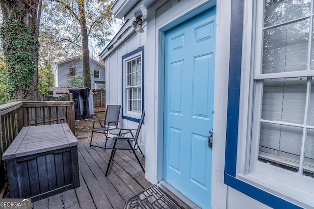 doorway to property with a deck