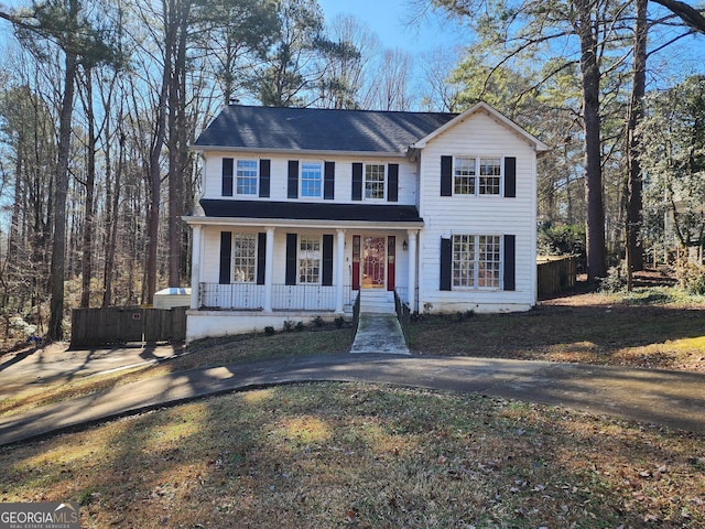 colonial inspired home with a porch