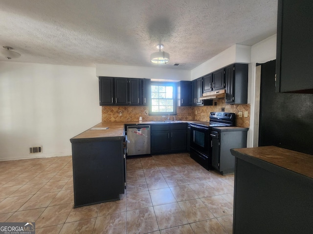 kitchen featuring light tile patterned flooring, stainless steel dishwasher, decorative backsplash, and black range with electric cooktop