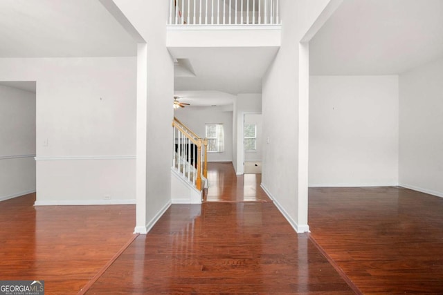 entryway with dark wood-type flooring