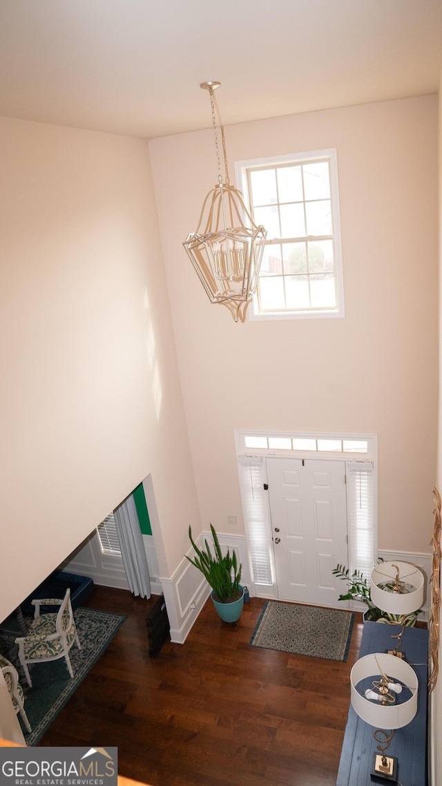 1320 Newbridge Cir, Buford, GA 30519 - entryway with a chandelier, wood finished floors, plenty of natural light, and a high ceiling