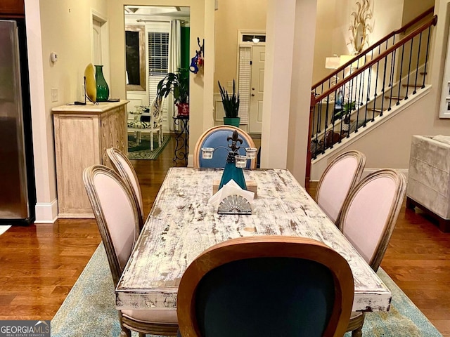 1320 Newbridge Cir, Buford, GA 30519 - dining space with dark wood finished floors and stairs