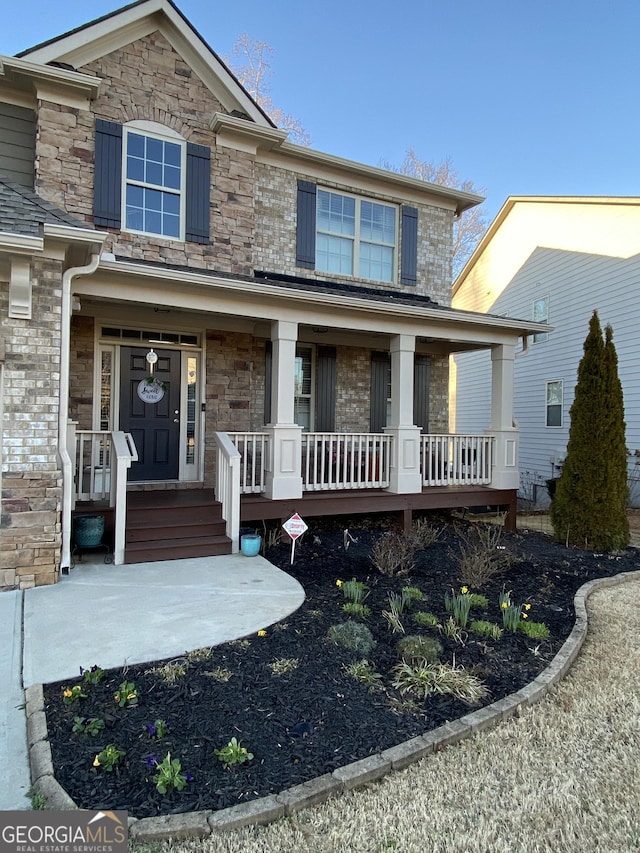 1320 Newbridge Cir, Buford, GA 30519 - view of front of home with a porch and stone siding