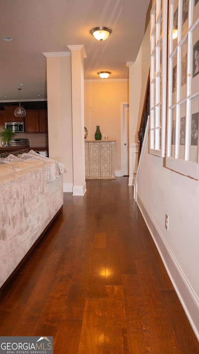 1320 Newbridge Cir, Buford, GA 30519 - corridor with ornamental molding, dark wood-style flooring, and stairs