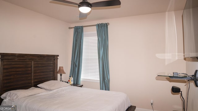 1320 Newbridge Cir, Buford, GA 30519 - bedroom with multiple windows and ceiling fan