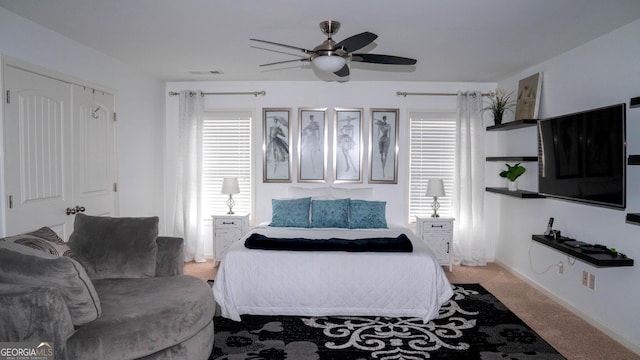 1320 Newbridge Cir, Buford, GA 30519 - bedroom featuring light colored carpet and a ceiling fan