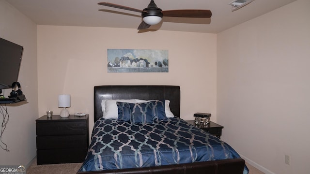 1320 Newbridge Cir, Buford, GA 30519 - carpeted bedroom with baseboards and ceiling fan