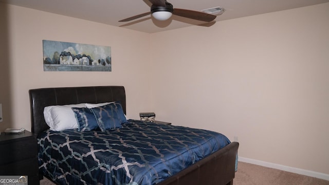 1320 Newbridge Cir, Buford, GA 30519 - carpeted bedroom with baseboards and a ceiling fan