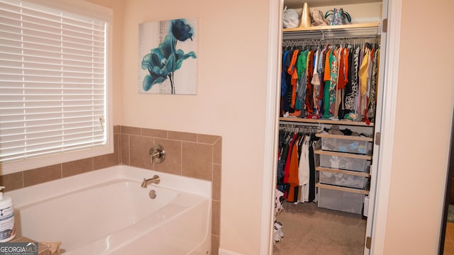 1320 Newbridge Cir, Buford, GA 30519 - bathroom with a bath and a spacious closet