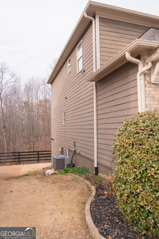 1320 Newbridge Cir, Buford, GA 30519 - view of home's exterior with a central air condition unit