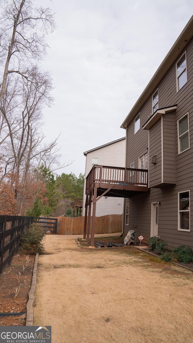 1320 Newbridge Cir, Buford, GA 30519 - view of yard featuring a deck