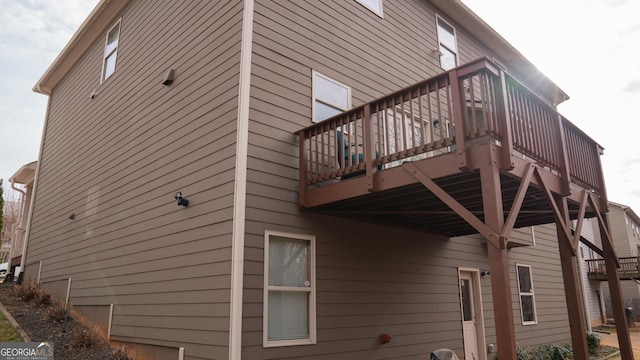 1320 Newbridge Cir, Buford, GA 30519 - view of home's exterior featuring a deck