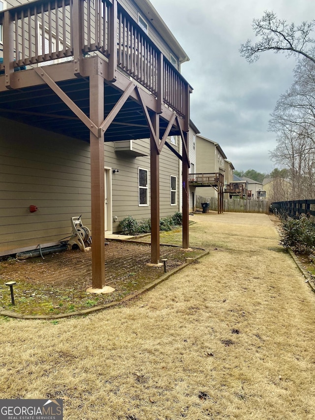 1320 Newbridge Cir, Buford, GA 30519 - view of grassy yard featuring a deck