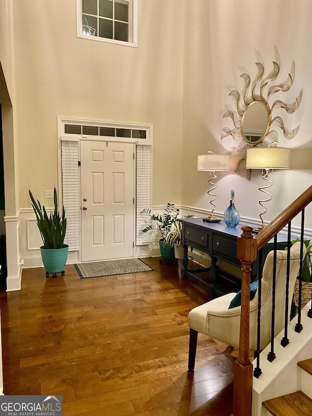 1320 Newbridge Cir, Buford, GA 30519 - entryway with a towering ceiling, wood finished floors, and stairway