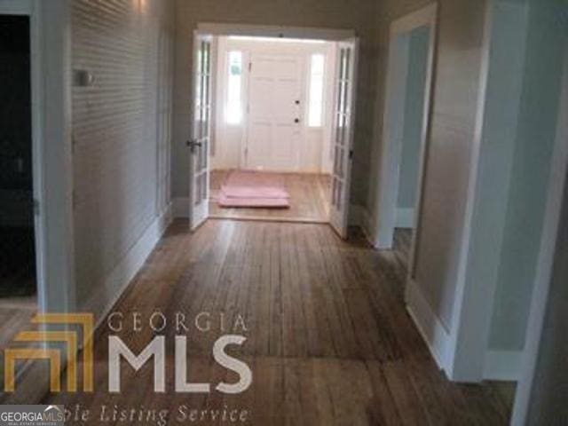 hall featuring dark hardwood / wood-style floors