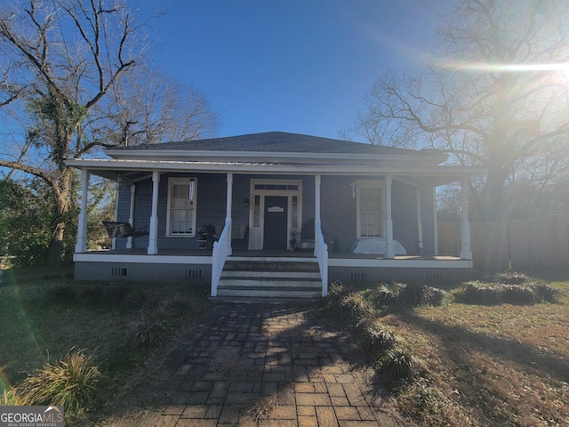 bungalow-style home with covered porch