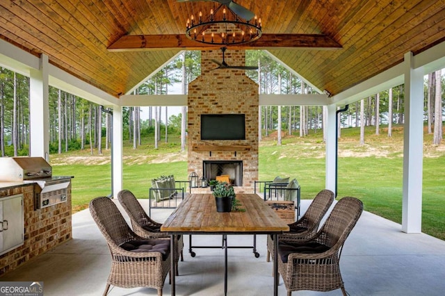 sunroom / solarium featuring an outdoor brick fireplace, vaulted ceiling with beams, wooden ceiling, and an inviting chandelier