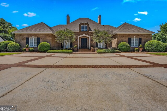 view of french country style house