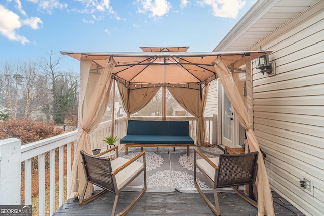 wooden deck with a gazebo