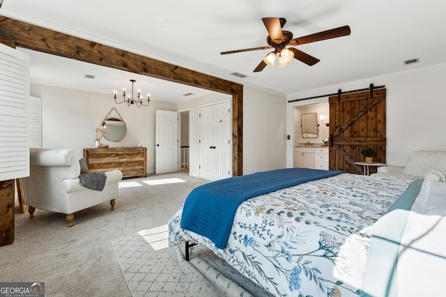 bedroom with crown molding, light colored carpet, a barn door, and a chandelier