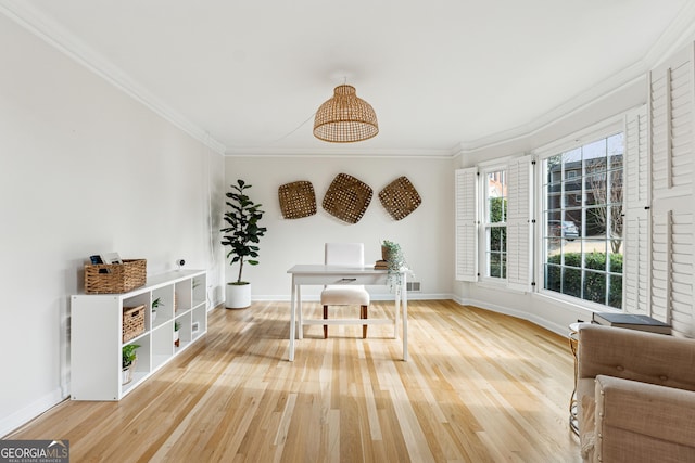 home office with ornamental molding and wood-type flooring