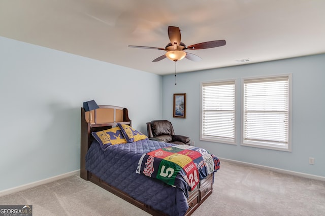 carpeted bedroom featuring ceiling fan