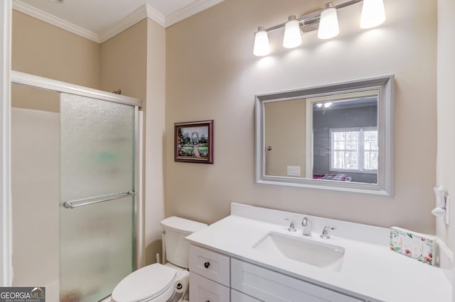 bathroom with vanity, an enclosed shower, ornamental molding, and toilet