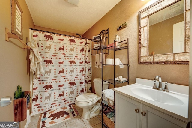 bathroom featuring tile patterned flooring, vanity, toilet, a textured ceiling, and a shower with shower curtain